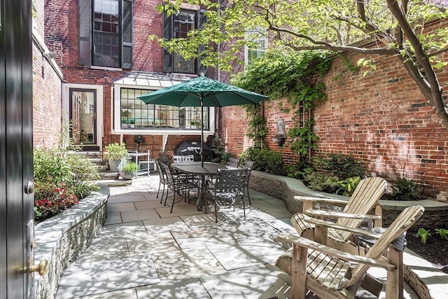 view of patio featuring outdoor dining space