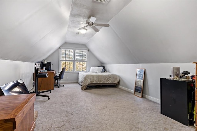 bedroom with vaulted ceiling, carpet floors, visible vents, and baseboards