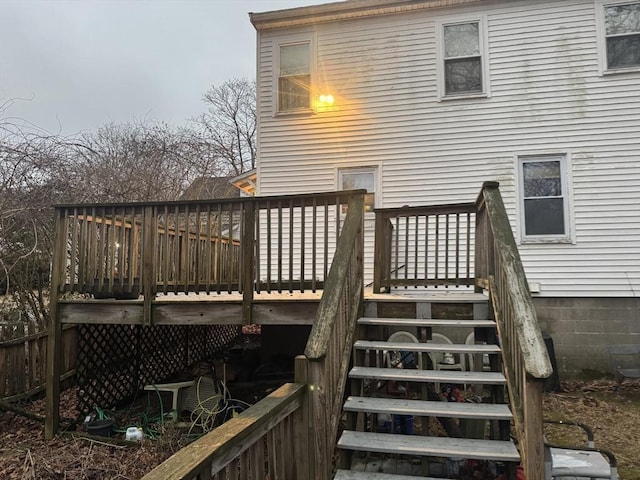 wooden terrace featuring stairway