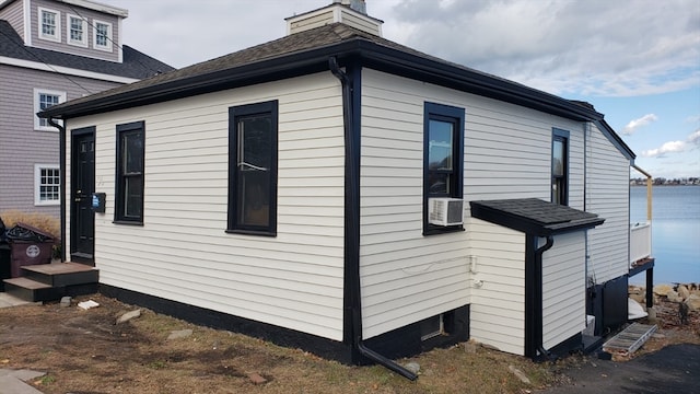 view of side of property featuring a water view