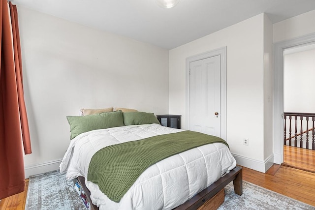 bedroom featuring wood-type flooring