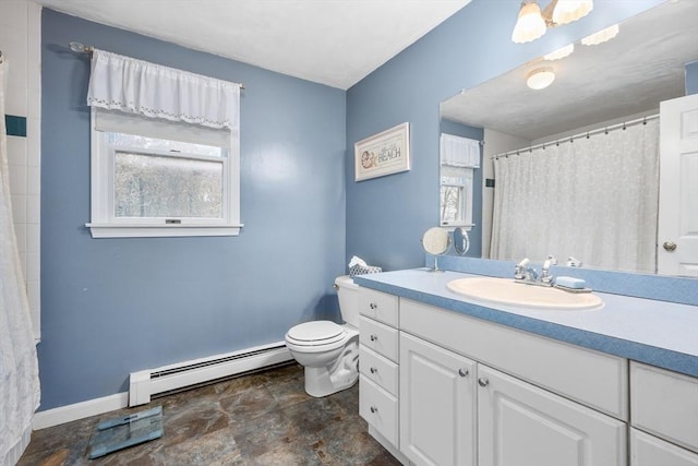bathroom with baseboards, baseboard heating, toilet, and a healthy amount of sunlight