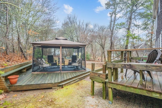 wooden deck with a gazebo