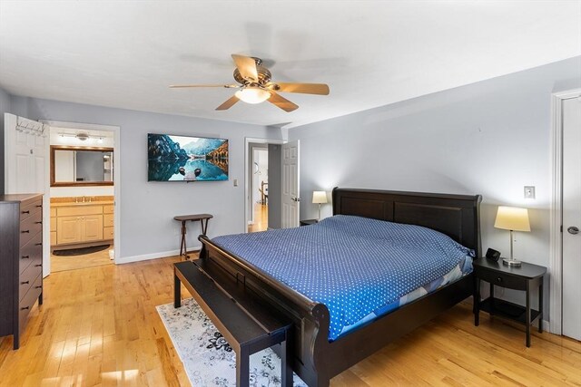 206 Cordaville Rd, Southborough, MA 01772 - bedroom with light wood-style floors, a sink, baseboards, a ceiling fan, and connected bathroom