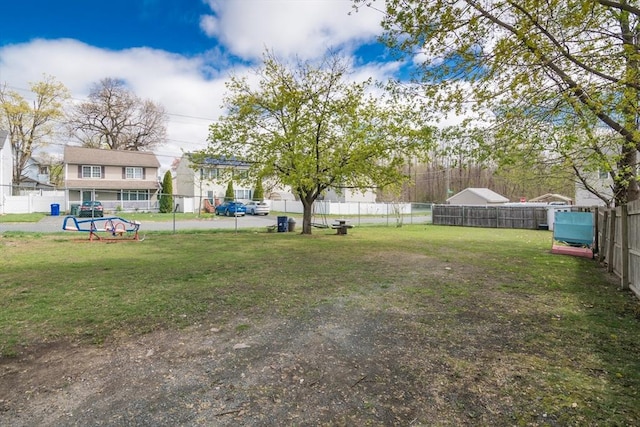 view of yard with fence