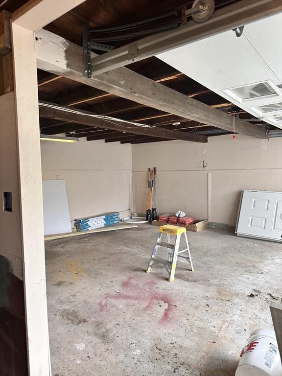 interior space featuring concrete flooring