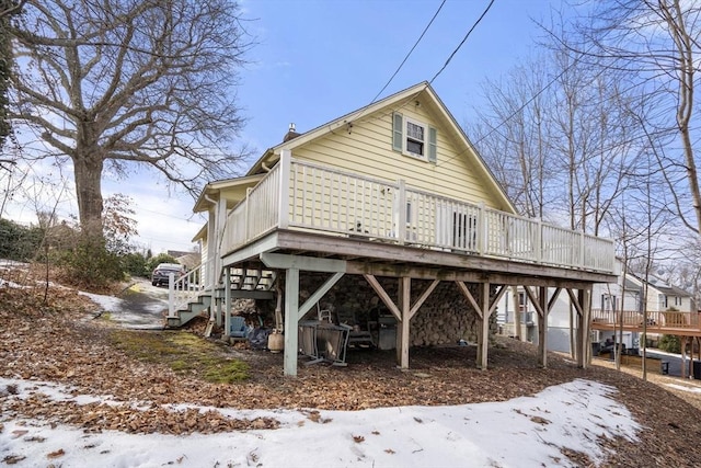 exterior space featuring a wooden deck