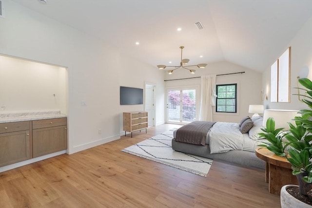 6 Hitching Post Ln, Wilbraham, MA 01095 - bedroom with access to exterior, a chandelier, light wood-style flooring, vaulted ceiling, and baseboards