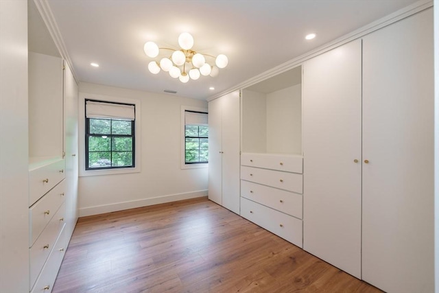6 Hitching Post Ln, Wilbraham, MA 01095 - unfurnished bedroom featuring light wood-type flooring, a chandelier, baseboards, recessed lighting, and crown molding