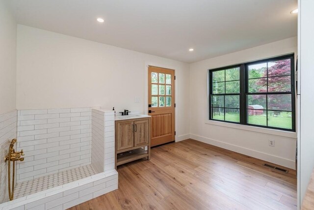 6 Hitching Post Ln, Wilbraham, MA 01095 - unfurnished room featuring light wood-style floors, a sink, baseboards, and recessed lighting