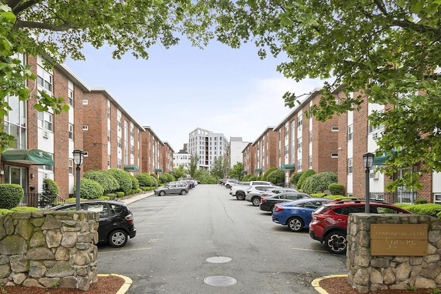 12 Commonwealth Ct Unit 12-16, Boston, MA 02135 - view of asphalt road featuring street lighting