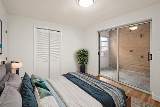 12 Commonwealth Ct Unit 12-16, Boston, MA 02135 - bedroom featuring wood finished floors and a closet