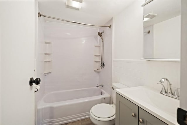 12 Commonwealth Ct Unit 12-16, Boston, MA 02135 - bathroom with vanity, toilet, shower / bath combination, and tile walls