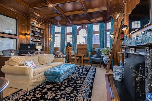 sitting room featuring coffered ceiling, crown molding, wooden ceiling, built in features, and beamed ceiling