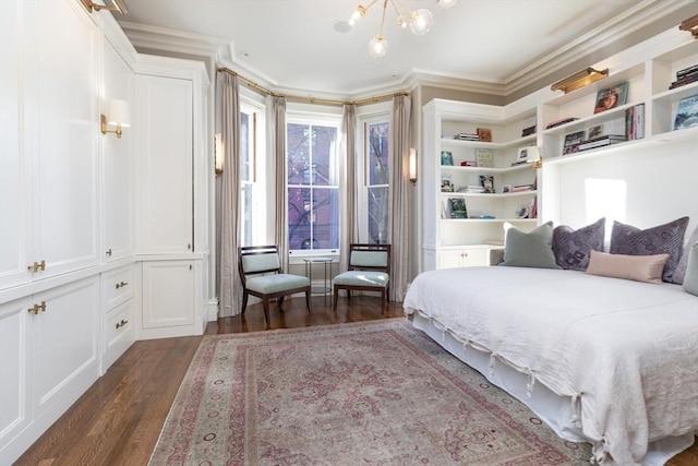 bedroom with crown molding, dark hardwood / wood-style floors, and an inviting chandelier