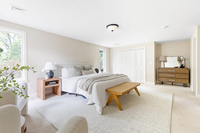 7 Langdon Rd, Natick, MA 01760 - bedroom featuring light colored carpet, a closet, and baseboards
