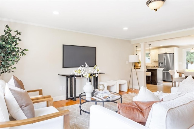 7 Langdon Rd, Natick, MA 01760 - living area with light wood-style flooring, recessed lighting, ornamental molding, and baseboards
