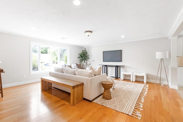7 Langdon Rd, Natick, MA 01760 - living room with ornamental molding, recessed lighting, light wood-style floors, and baseboards