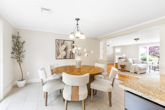 7 Langdon Rd, Natick, MA 01760 - dining space with ornate columns, ornamental molding, light tile patterned flooring, and baseboards