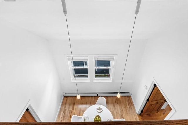 23 Turner St Unit 4, Salem, MA 01970 - detailed view of a baseboard radiator and wood finished floors