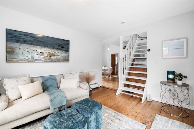 23 Turner St Unit 4, Salem, MA 01970 - living room with stairs, wood-type flooring, and baseboard heating
