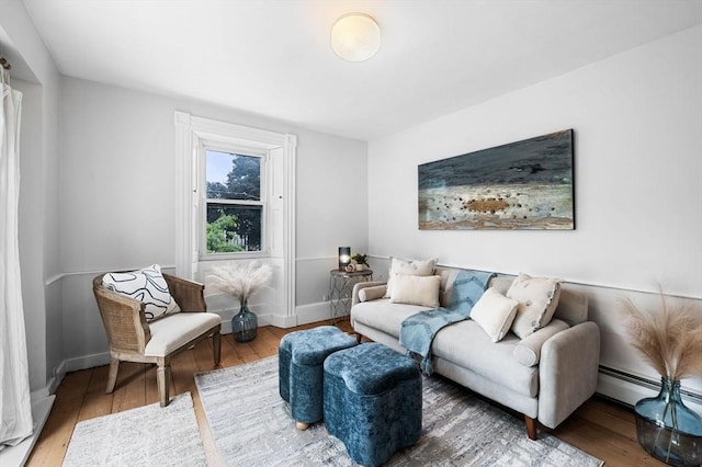 23 Turner St Unit 4, Salem, MA 01970 - living area featuring wood finished floors and a baseboard heating unit