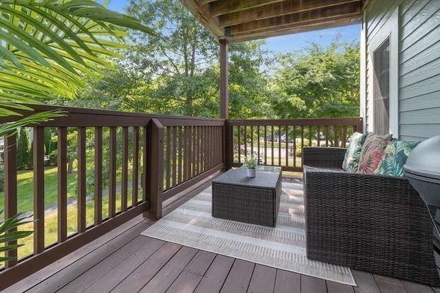 deck with an outdoor hangout area