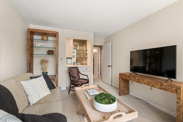 living room featuring light carpet