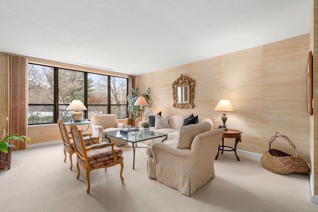 living room with expansive windows and carpet flooring