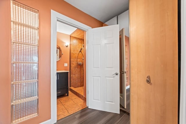 hallway with dark wood-style floors