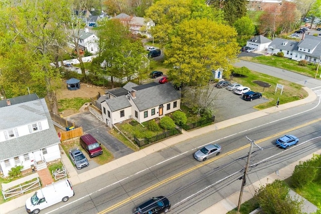 birds eye view of property with a residential view