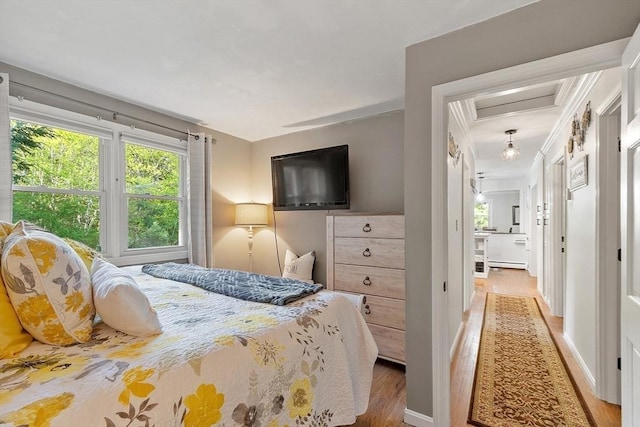 14 Mossman Rd, Westminster, MA 01473 - bedroom with wood finished floors, multiple windows, and baseboards