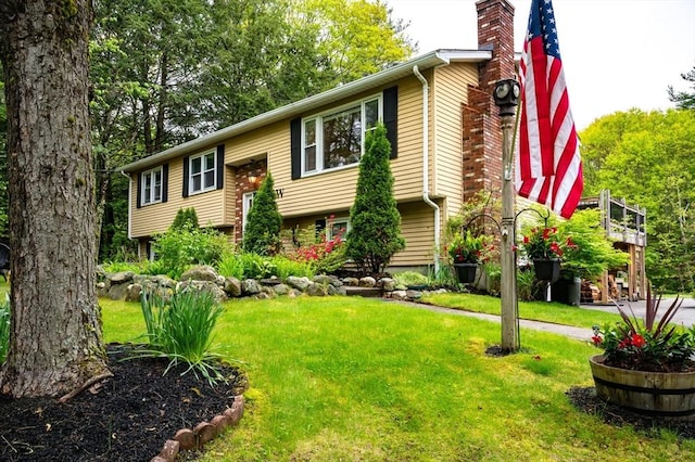 14 Mossman Rd, Westminster, MA 01473 - split foyer home featuring a chimney and a front lawn