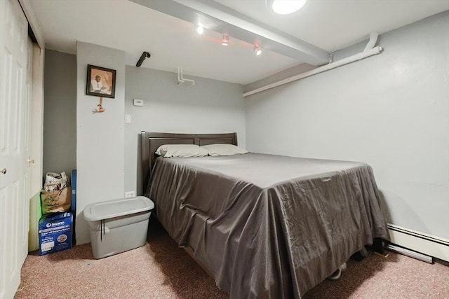 bedroom featuring carpet floors and baseboard heating