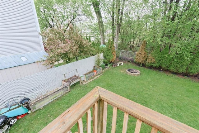 view of yard with an outdoor fire pit