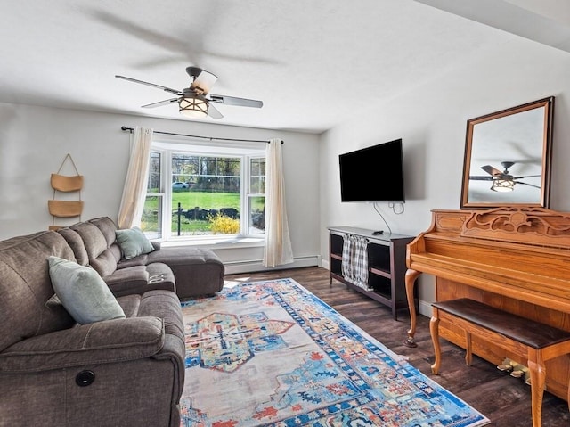 living room with ceiling fan, a baseboard heating unit, and wood finished floors