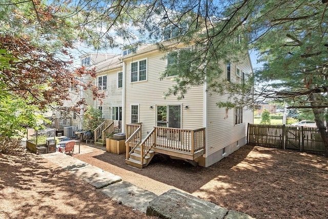 51 Loomis St Unit 51, Cambridge, MA 02138 - back of property featuring a deck and a patio area