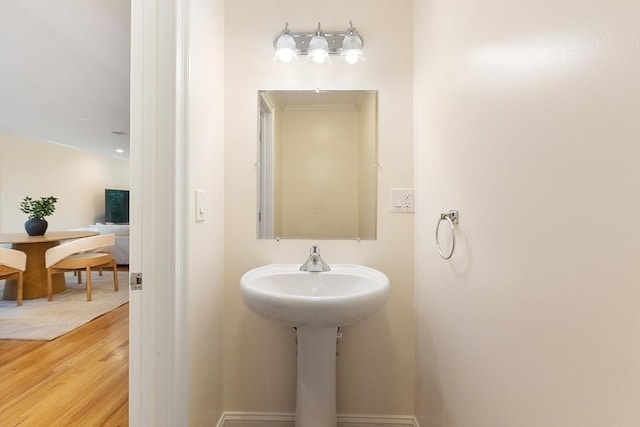 51 Loomis St Unit 51, Cambridge, MA 02138 - bathroom with wood finished floors and baseboards
