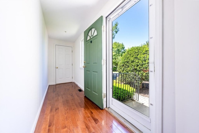 9 Longwood Rd Unit 239, Mashpee, MA 02649 - doorway to outside with wood finished floors and baseboards