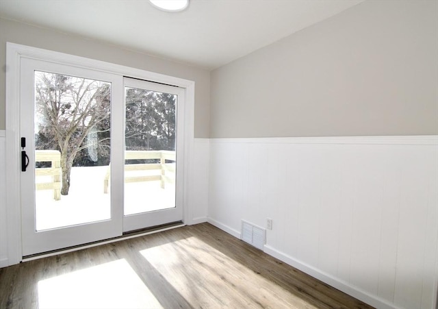 doorway featuring light hardwood / wood-style floors