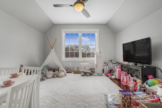 bedroom featuring ceiling fan and vaulted ceiling