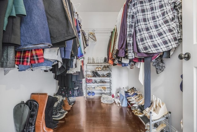 walk in closet featuring hardwood / wood-style floors