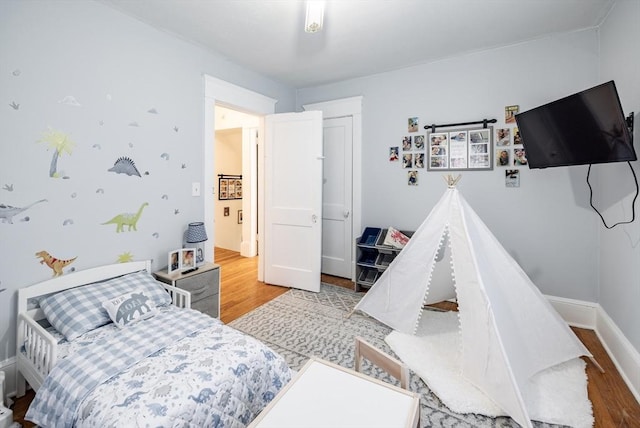 bedroom featuring hardwood / wood-style floors