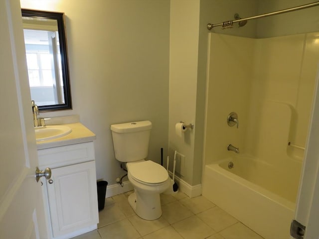 bathroom with toilet, tile patterned flooring, baseboards, bathing tub / shower combination, and vanity