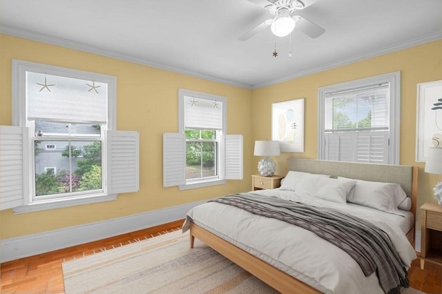 30 Oakland St Unit 2, Newburyport, MA 01950 - bedroom with wood finished floors, multiple windows, ornamental molding, and ceiling fan