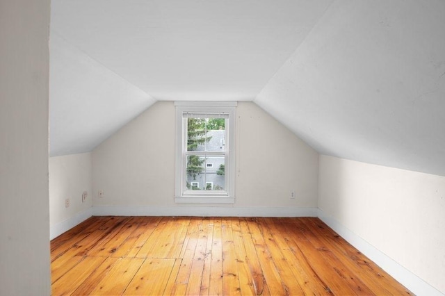 30 Oakland St Unit 2, Newburyport, MA 01950 - additional living space with light wood-style floors and vaulted ceiling