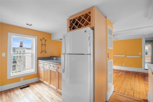 30 Oakland St Unit 2, Newburyport, MA 01950 - kitchen with freestanding refrigerator, light wood-style flooring, and recessed lighting