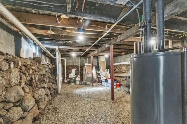 unfinished basement with water heater