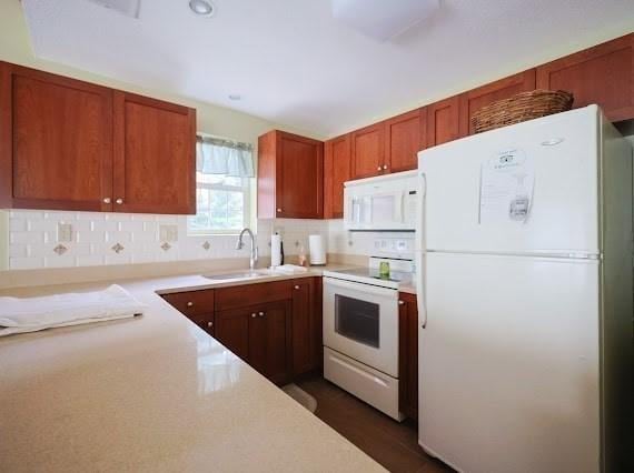 14 Shaw Farm Rd Unit 14, Canton, MA 02021 - kitchen featuring white appliances, decorative backsplash, and light countertops