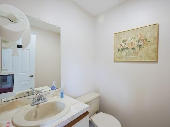14 Shaw Farm Rd Unit 14, Canton, MA 02021 - half bathroom featuring toilet and vanity
